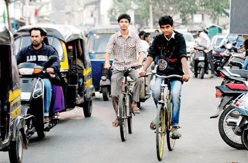 Conditions Apply: The bicycles will be provided to those students of Std VII-X, whose homes are more than  2 kilometres away from their respective PMC schools. Representation Pic