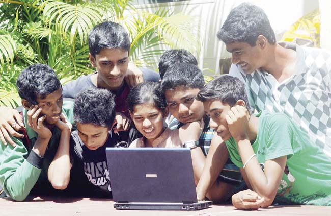 SSC pass children of domestic and construction workers will be provided laptops, while those studying in Std V to X will be given tablets to enhance learning skills. Representation Pic