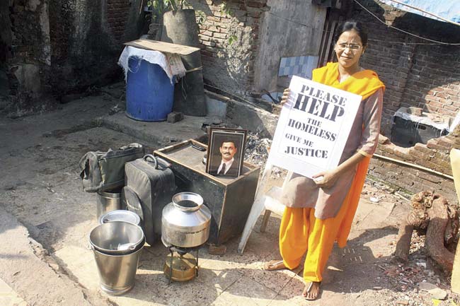 This is the picture Veena has put up on her Facebook page, showing her surrounded by utensils, suitcases and a stool