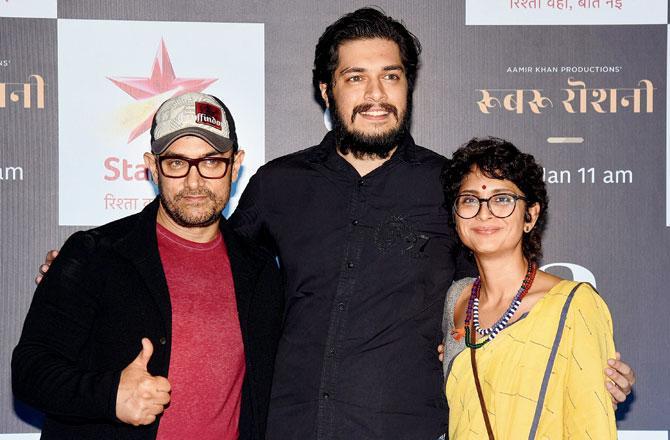 Junaid Khan flanked by Aamir Khan and his wife Kiran Rao. Pic/AFP