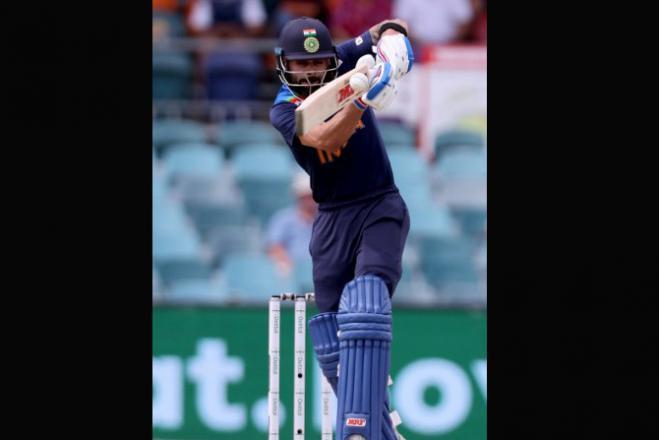 India's captain Virat Kohli plays a shot during the third one-day international cricket match between Australia and India at Manuka Oval in Canberra on December 2, 2020. Pic/ AFP