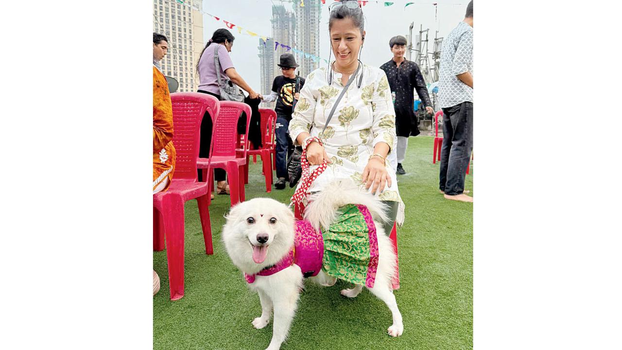 Pari with her caretaker at the event in Thane. PIC COURTESY/CAP MUMBAI