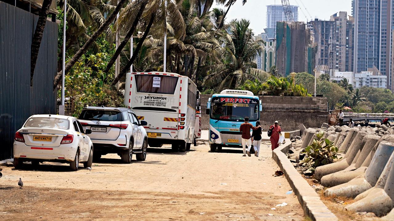 Heavy vehicle violation: A bus parked on the Dadar beach stretch on April 6, in violation of CRZ norms. Pic/Ashish Raje
