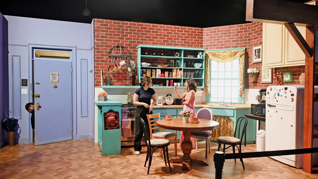 A section features Monica&rsquo;s kitchen with the instantly recognisable purple door