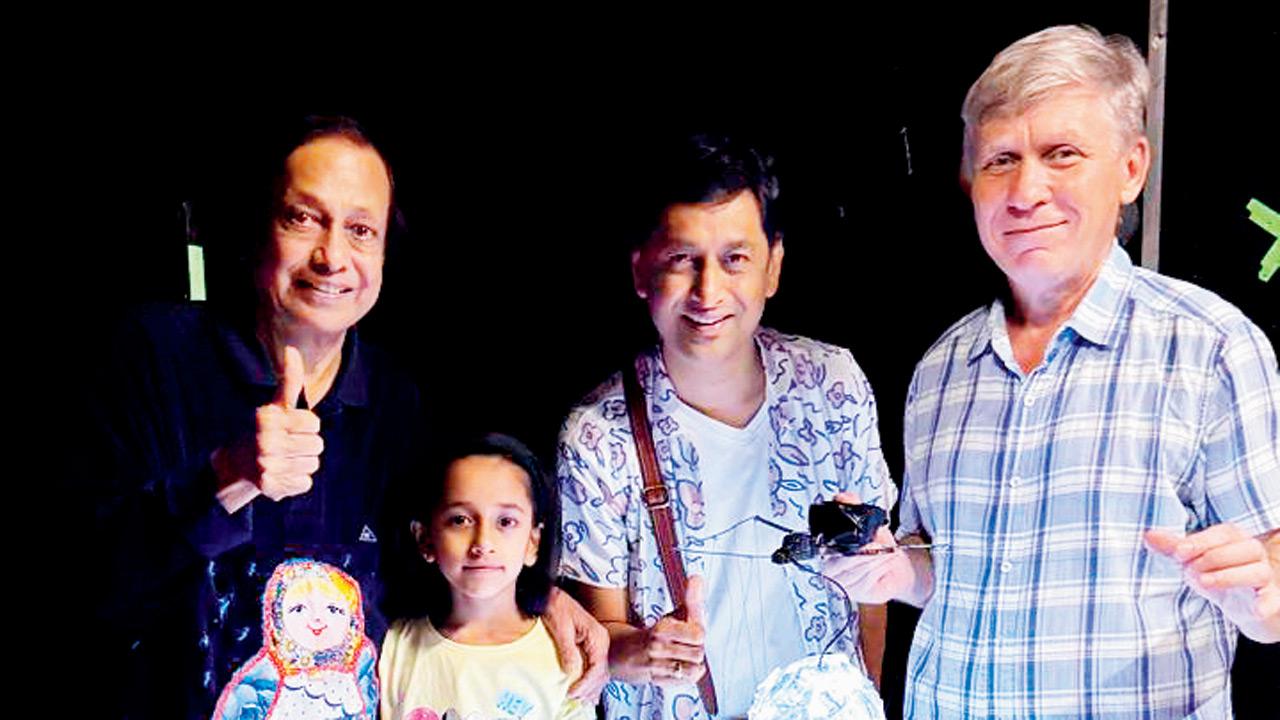 (From left) Ramdas, granddaughter Neeva, and Satyajit Padhye with Nikolai Zykov. PIC COURTESY/SATYAJIT PADHYE
