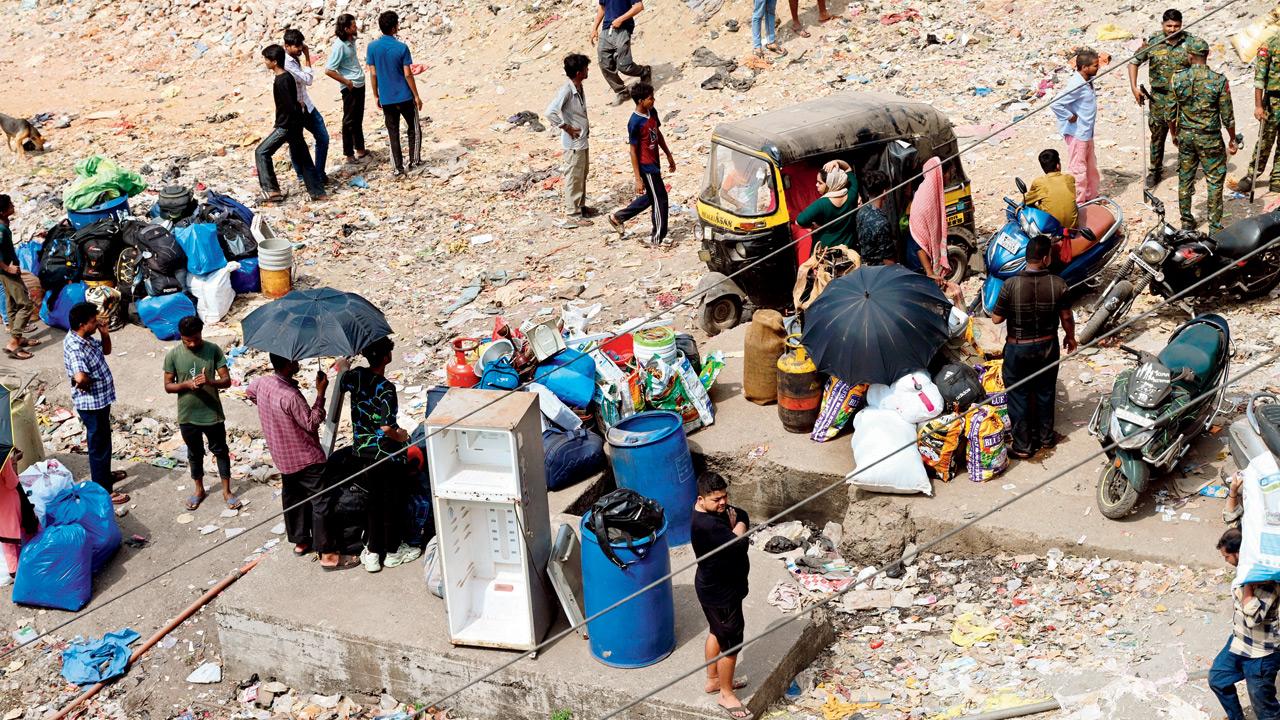 Household items kept in the open after structures were cleared during the anti-encroachment drive near Bandra station