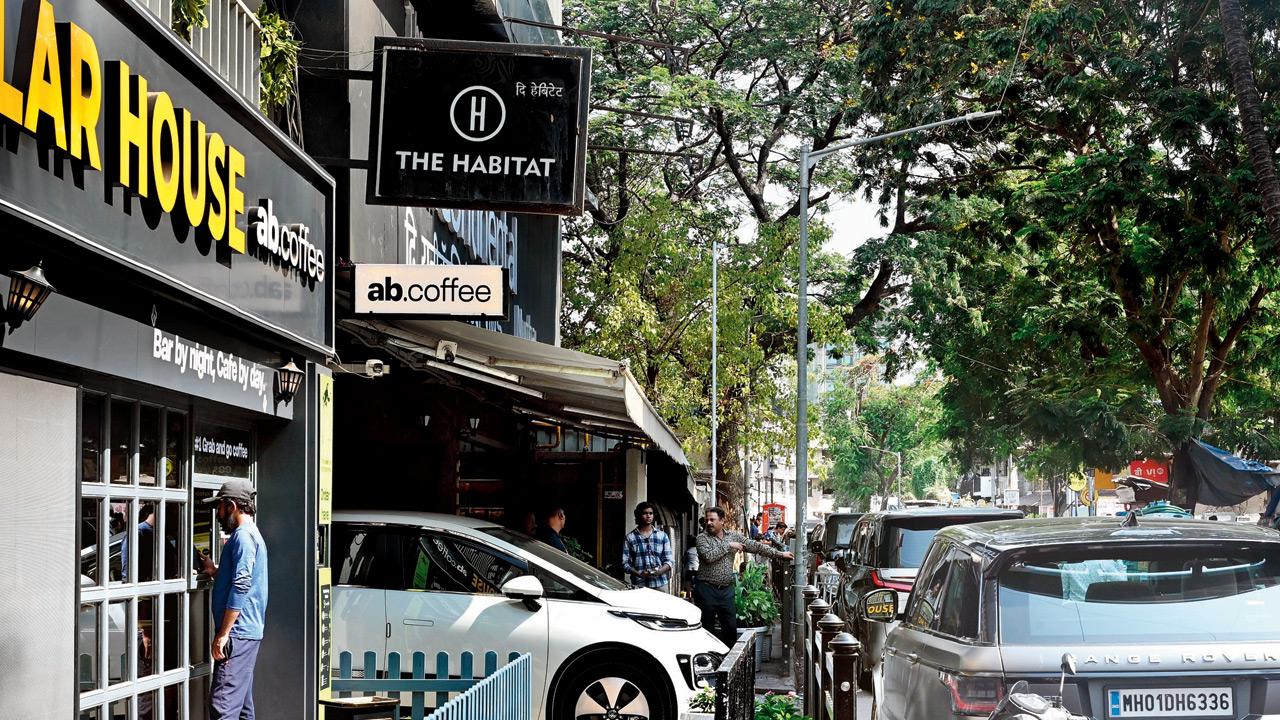 The footpath outside Hotel UniContinental allegedly blocked by parked vehicles and structures on May 21 before civic action