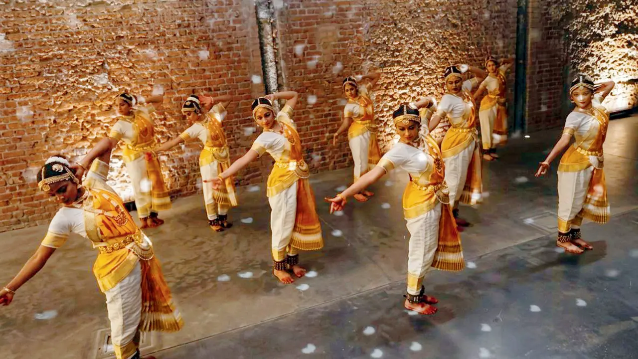 A still from the music video where the dancers recreate the iconic Michael Jackson pose