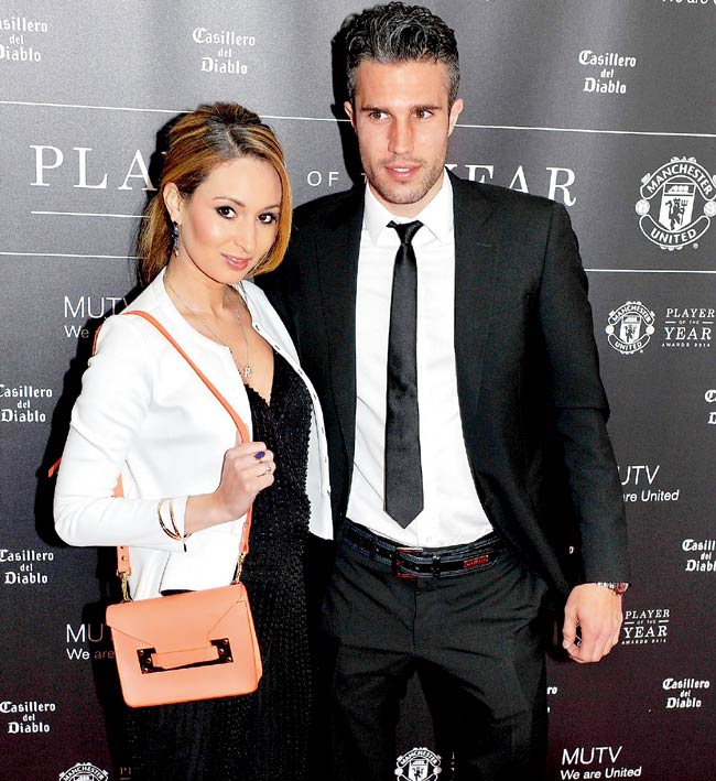 Robin van Persie with his wife Bouchra at an event recently