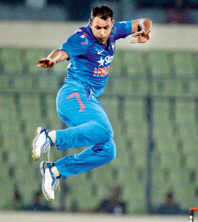 Stuart Binny celebrates the wicket of Mohammad Mahmudullah during the tie against Bangladesh in Dhaka yesterday. Pic/AP/PTI