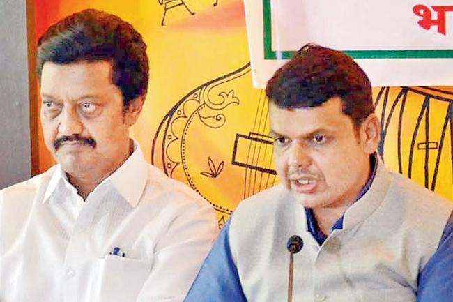 In attack mode: State BJP president Devendra Fadnavis (right) with party’s Lok Sabha MP from the city, Anil Shirole