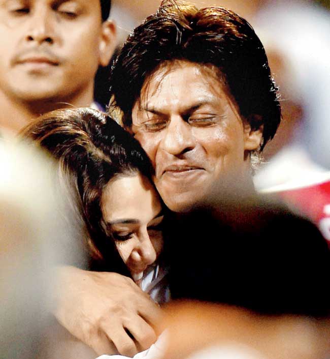 KKR boss Shah Rukh Khan greets Preity Zinta after their clash against KXIP on Wednesday