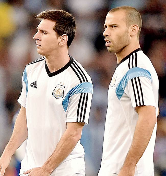 Lionel Messi (left) with Javier Mascherano