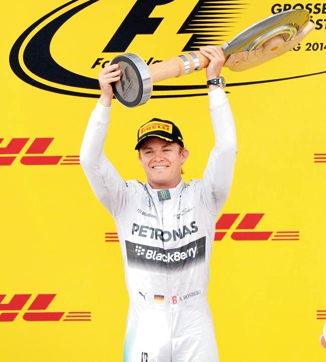 Nico Rosberg with his trophy. Pic/AFP