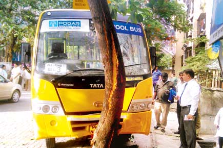 Kids have a narrow escape as school bus crashes into tree