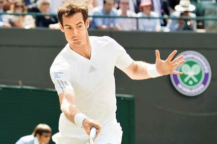 Wimbledon: Andy Murray eases into second round while Victoria Azarenka bows out