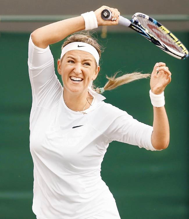 Victoria Azarenka plays a return shot to Bojana Jovanovski yesterday