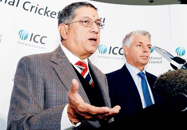 Newly elected ICC chairman N Srinivasan (left) addresses the media as ICC chief executive David Richardson looks on during the Annual Conference in Melbourne yesterday. Pic/AFP
