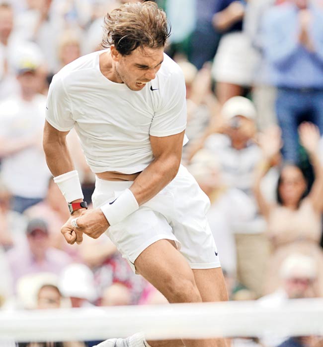 Rafael Nadal is ecstatic after winning his Wimbledon Round Two match against Lukas Rosol in London yesterday. Pic/AFP