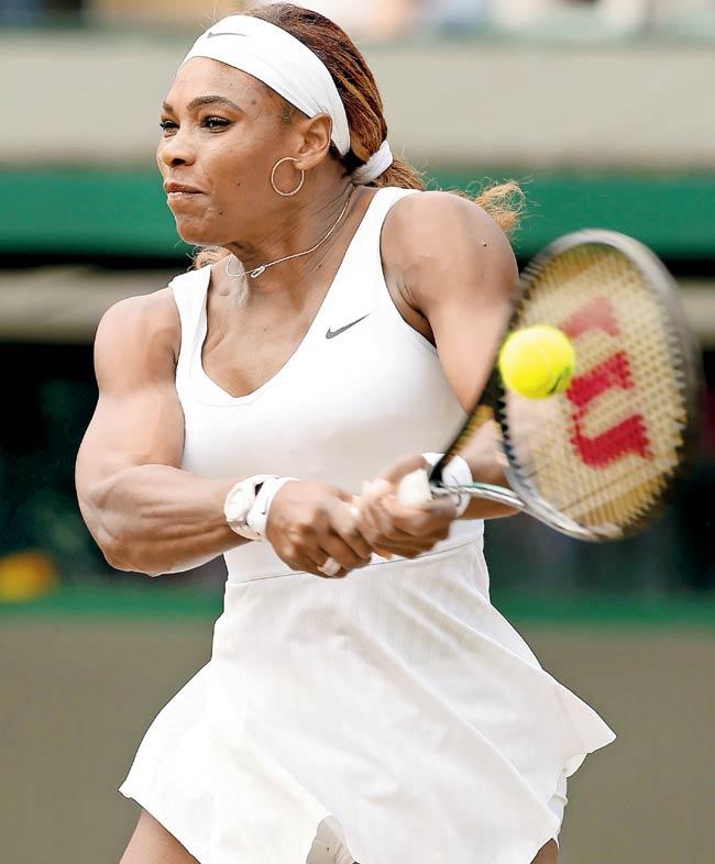 Serena Williams returns to Chanelle Scheepers. Pic/AFP