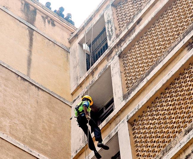 On Saturday apartments on the seventh, 11th, 15th and 17th floor of Mid Town apartment at Campa Cola compound saw their essential services being disconnected. PIc/sayyed sameer abedi