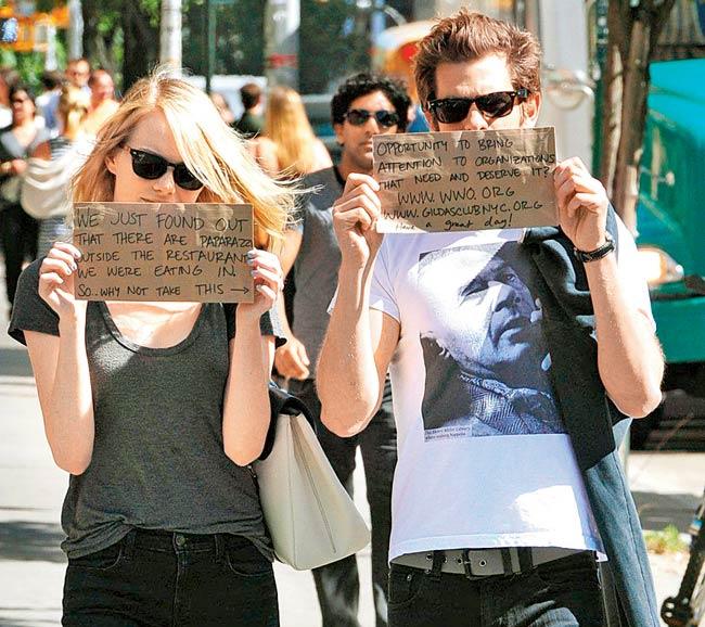 Emma Stone and Andrew Garfield recently flashed cardboard placards, garnering attention towards a charity organisation