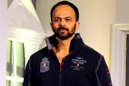 Happy working with Ajay Devgn and Shah Rukh Khan: Rohit Shetty