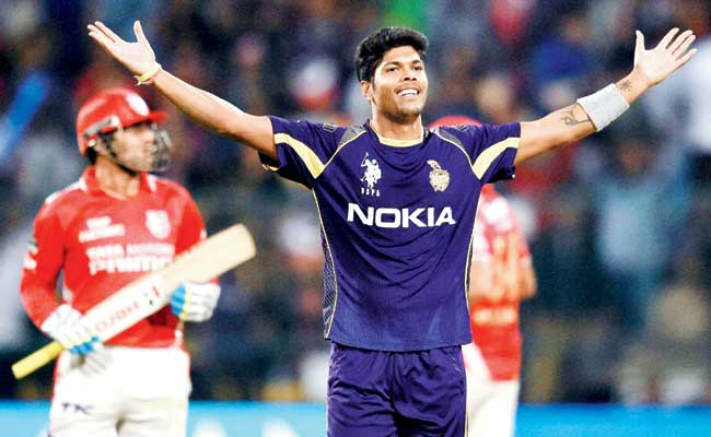 KKR pacer Umesh Yadav celebrates the wicket of Virender Sehwag during the tie against Kings XI Punjab on Sunday.  Pic/PTI