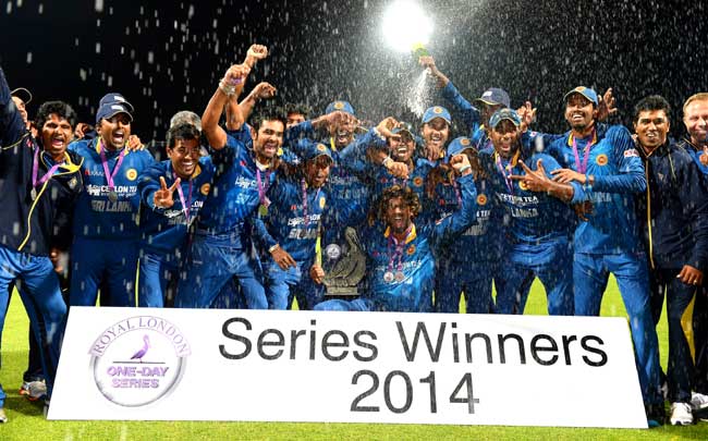 The Sri Lankan team celebrate with the series trophy after winning the fifth one-day international (ODI) cricket match between England and Sri Lanka at Edgbaston in Birmingham. Pic/AFP