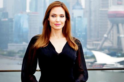 Queen makes Angelina Jolie honorary dame 