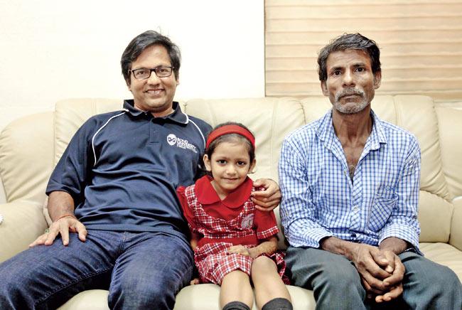 Dr Vijay Patil, president of D Y Patil University, with Anisha Mandal and her grandfather Saurabuddin
