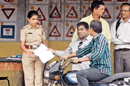 Go away or you will be beaten to a pulp: RTO inspector after getting caught
