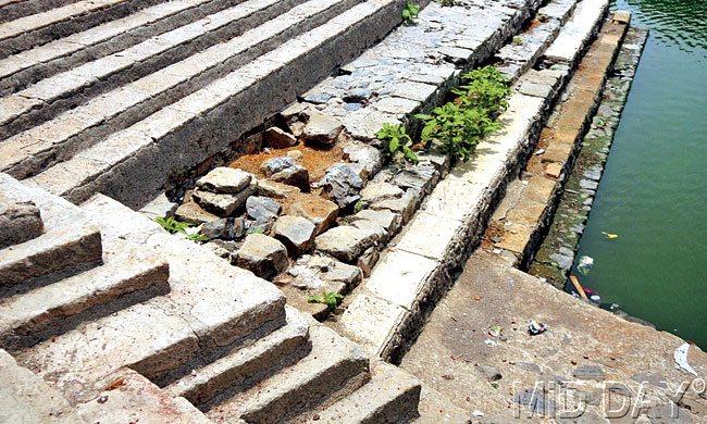Broken steps are a bane for the faithful at Banganga