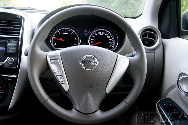 The steering wheel is brand new, and has all the controls positioned on the left. The rim is leather wrapped on top spec variants