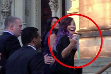 Demi Lovato shows middle finger to fans!