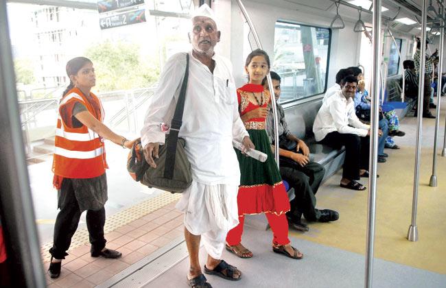 73-year-old Airoli resident Natha Arjun More enjoys his first Metro journey. Pic/Pradeep Dhivar