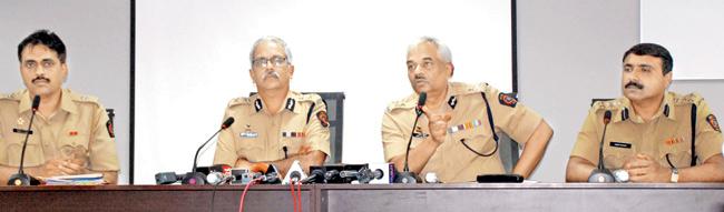  Police Commissioner Satish Mathur (second from left) addresses a press conference with DCP Manoj Patil (extreme left), Joint CP Sanjay Kumar (second from right) and Additional CP Abdur Rehman (extreme right) at a press conference yesterday