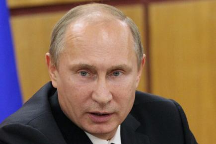 Putin to ensure probe team reaches MH17 crash site