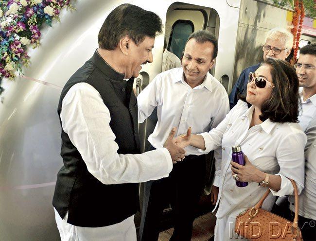 Chief Minister Prithviraj Chavan, who inaugurated the Metro, is greeted by Anil Ambani and wife Tina at Ghatkopar station. Pics/Datta Kumbhar