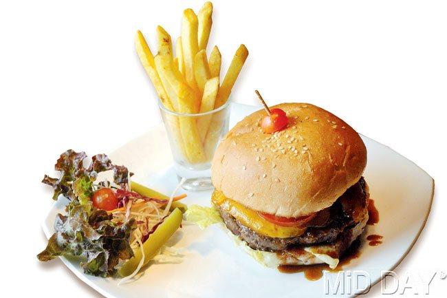 The Epic Burger comes with a beef patty smeared with Jack Daniel’s sauce at Brickhouse Café & Bar. pics/nimesh dave 