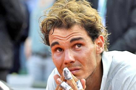 French Open champ Rafael Nadal not optimistic of winning Wimbledon