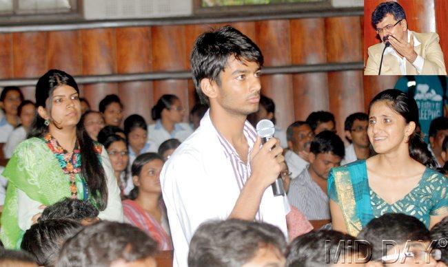 A student asks questions of Minister Jitendra Awhad (inset) at the B J Medical College