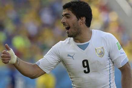 FIFA World Cup: Suarez bite kicks off a storm as Uruguay sink Italy