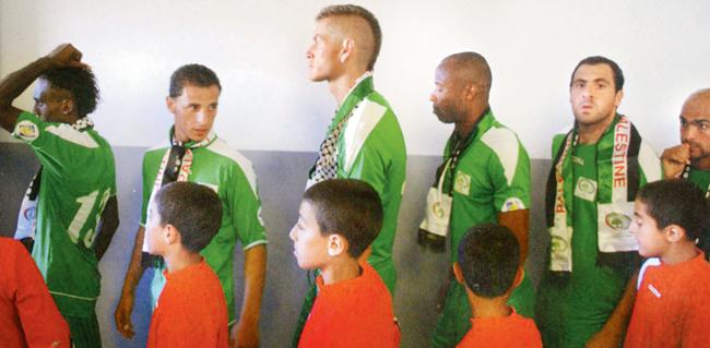 Tursunzode, Tajikistan, June 2011. The Palestine national team wait in the tunnel before their first Brazil 2014 qualification match against Afghanistan