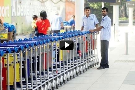 Caught on Camera: Touts at Mumbai airport demand USD 20 for a trolley