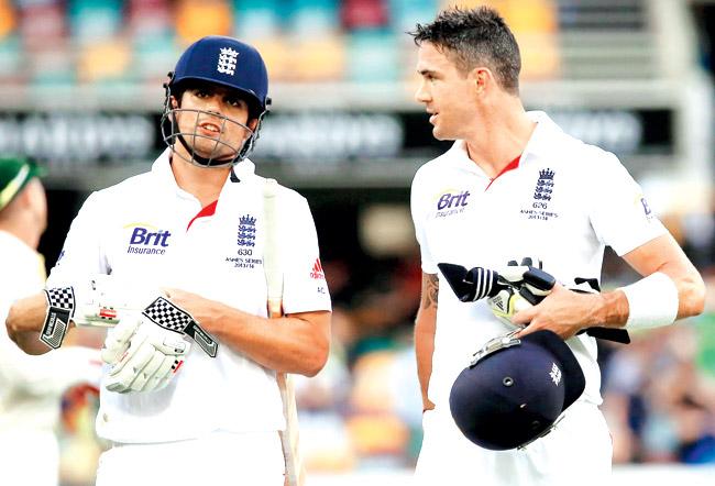 Kevin Pietersen (right) with England skipper Alastair Cook during the first Ashes Test at the Gabba in Brisbane last year. Pic/Getty Images