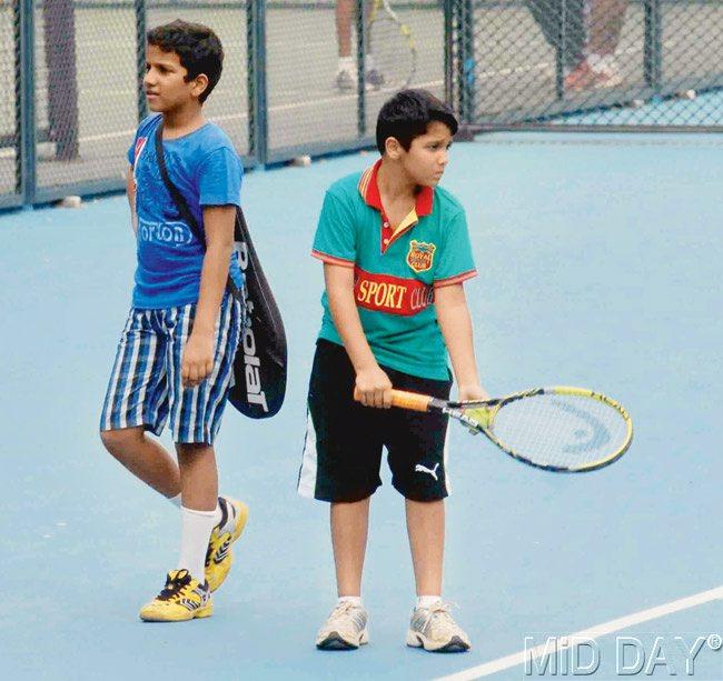 Players practice before their MSSA matches at the MSLTA tennis courts. Pic/Atul Kamble