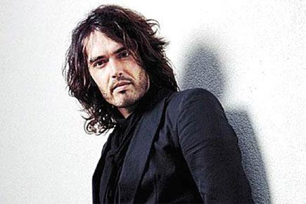 Russell Brand faces Twitter ban after posting journo's details