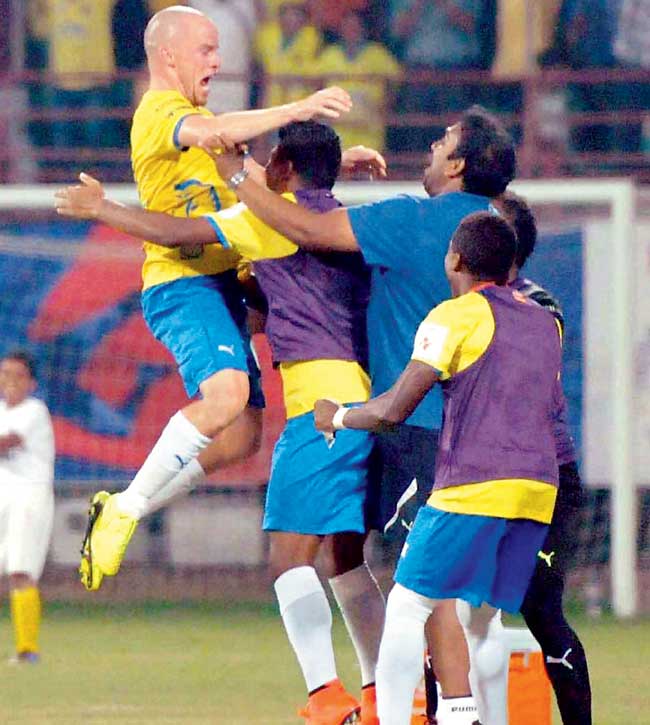 Iain Hume (left) celebrates a goal with teammates yesterday. Pic/PTI