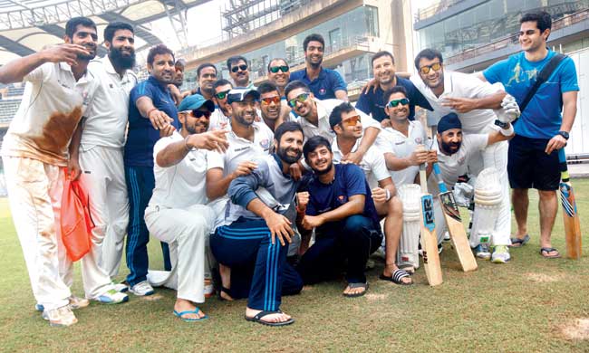 The J&K team celebrate their win over Mumbai at the Wankhede Stadium yesterday